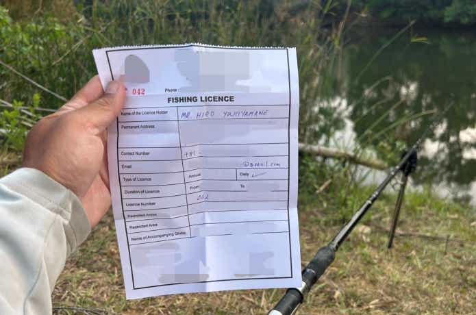 オレンジフィンマシールの生息する川で釣りをするための許可証